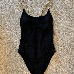 Aerie black one piece women’s swim suit with gold straps